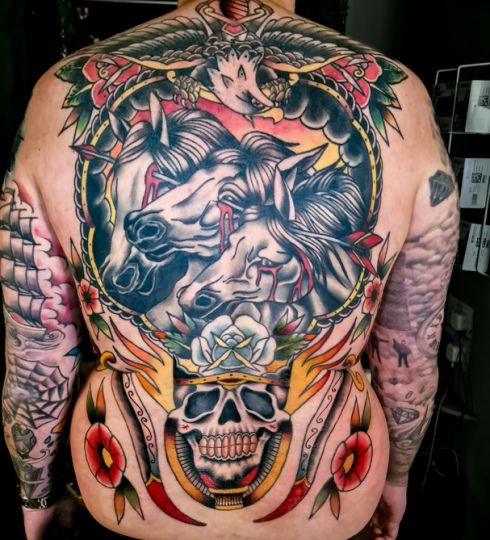 Traditional back tattoo by Rick at broken puppet tattoo uk