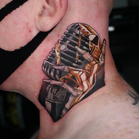 Neck tattoo by Rick at broken puppet tattoo Uk