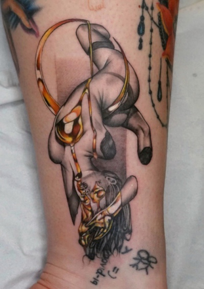 Gold drip tattoo by Rick at broken puppet tattoo