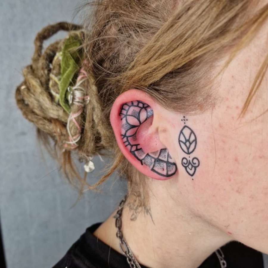 Ornamental ear tattoo Worthing uk