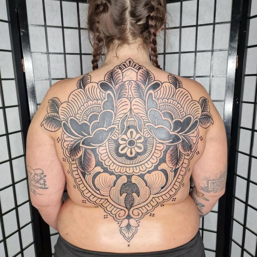 Floral mandala back tattoo done at broken puppet tattoo Worthing uk
