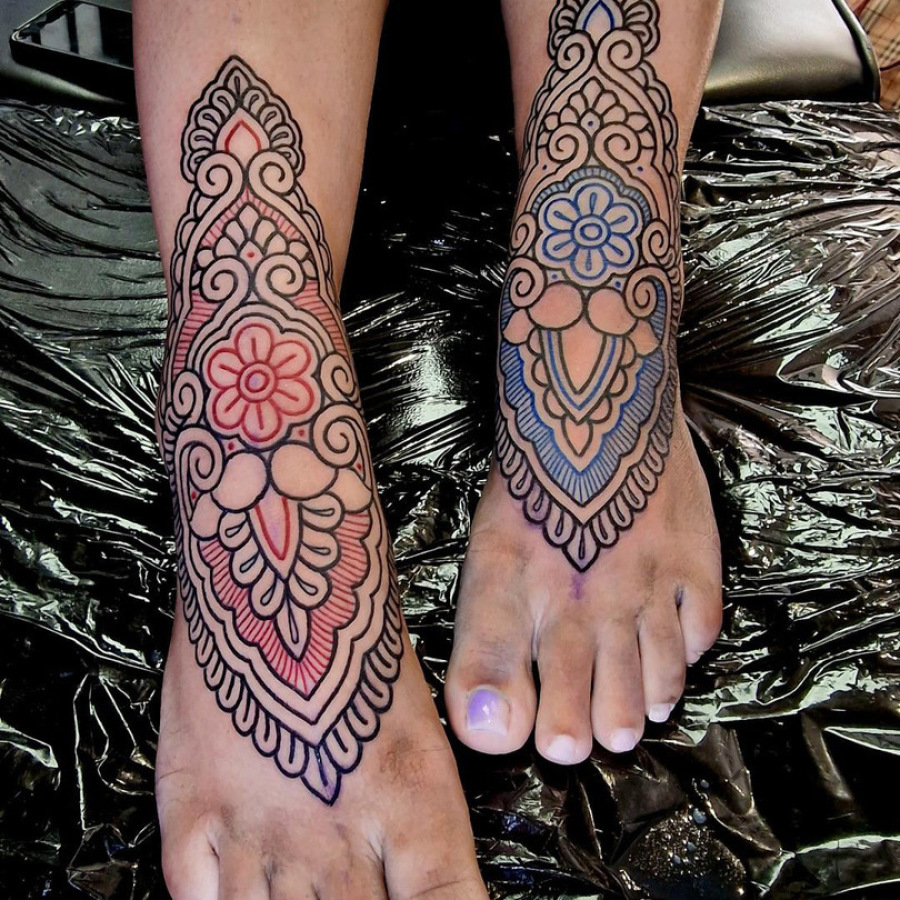 Decorative feet tattoos done at broken puppet tattoo in Worthing uk