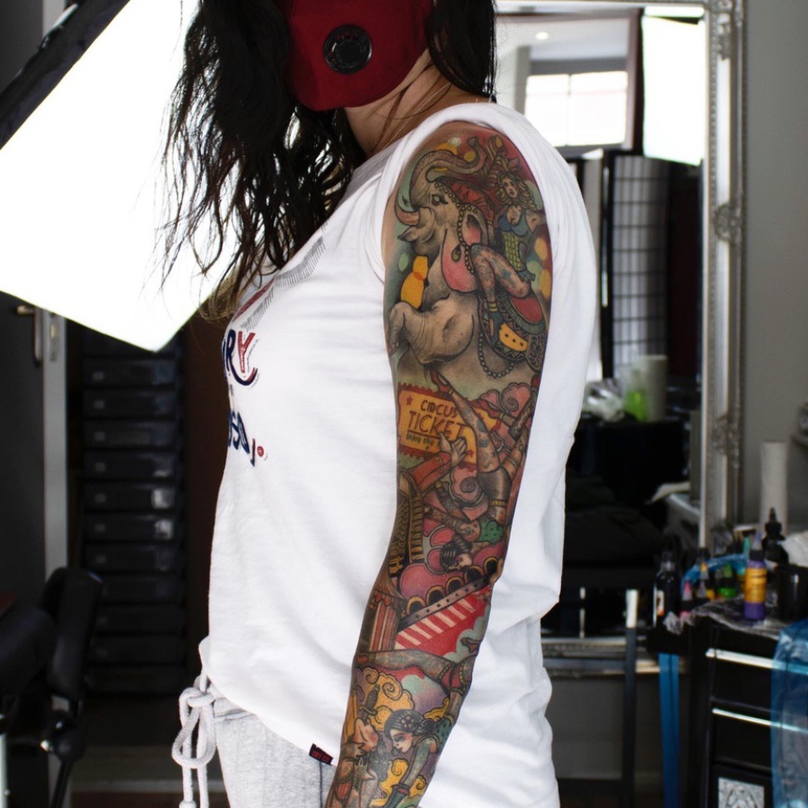 Traditional sleeve tattoo circus themed by Rick at broken puppet tattoo in worthinh